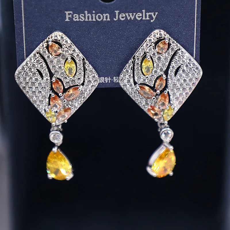 Jewelry Fashion New Simple Women's Earrings European and American Hand-Inlaid Zircon Diamond Yellow Water Drop Earrings
Jewelry Fashion New Simple Women's Earrings European and American Hand-Inlaid Zircon Diamond Yellow Water Drop Earrings
