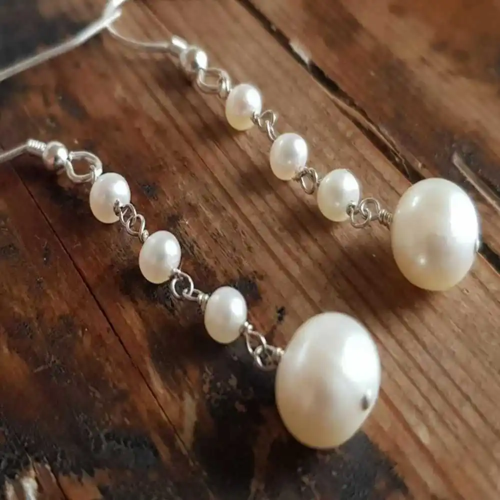 Natural white rice pearl freshwater pearl earrings Beautiful Fashion Lucky Aquaculture Gift Easter Christmas
Natural white rice pearl freshwater pearl earrings Beautiful Fashion Lucky Aquaculture Gift Easter Christmas