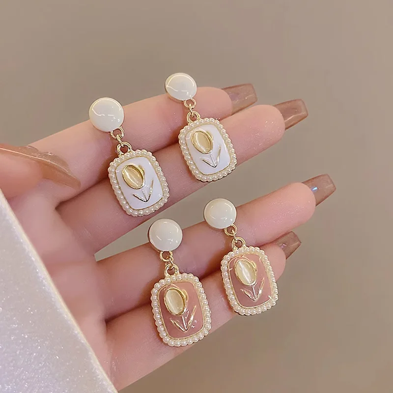 

S925 silver needle niche pearl opal tulip gentle light luxury temperament high-end design sense stud earrings