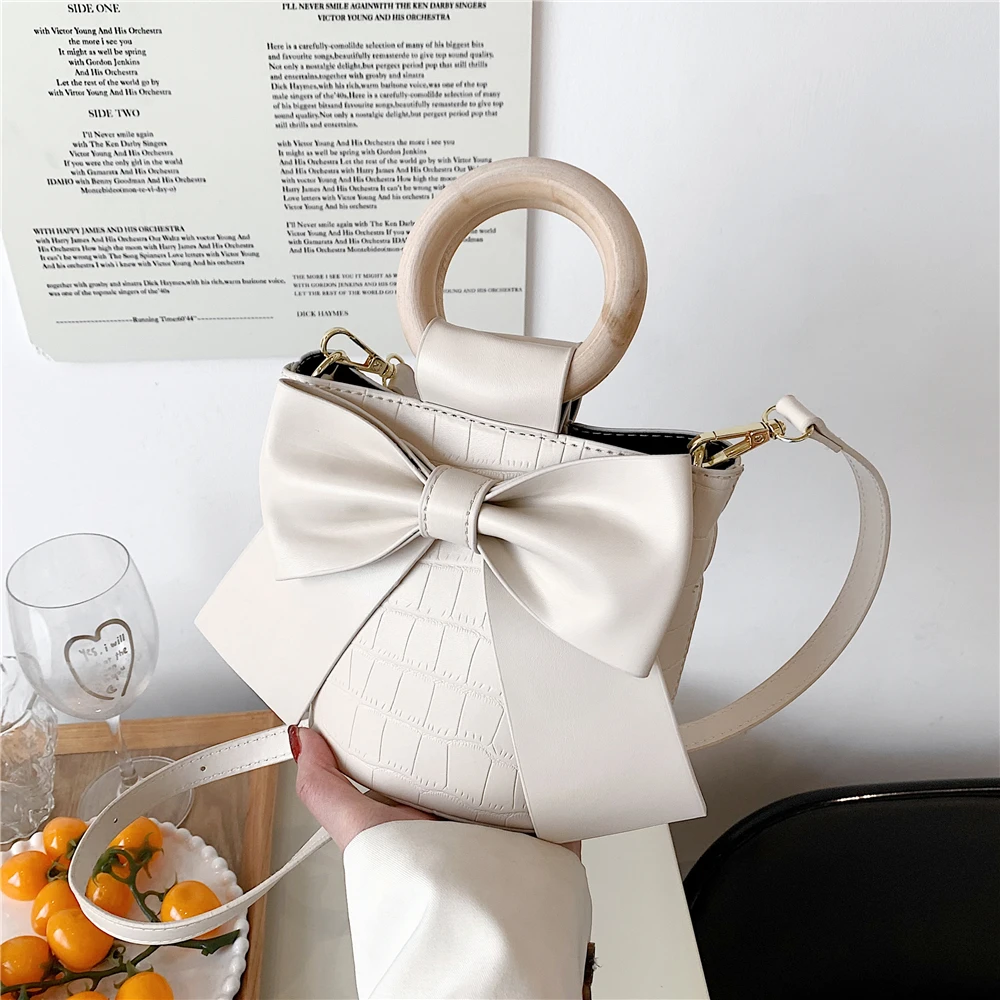 Burminsa Kawaii Bow Knot Bucket Mini Women Handbags Trends 2022 Wooden Ring Stone Pattern Fashion Ladies Shoulder Crossbody Bags
Burminsa Kawaii Bow Knot Bucket Mini Women Handbags Trends 2022 Wooden Ring Stone Pattern Fashion Ladies Shoulder Crossbody Bags