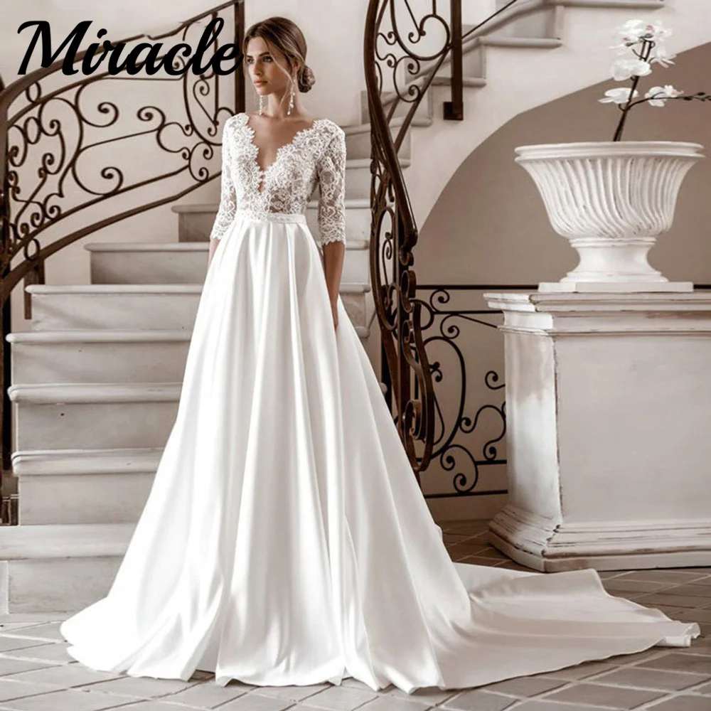 Half Sleeve Satin A-Line Wedding Dresses Elegant V Neck Bridal Wedding Gown Illusion Lace Bride Vestidos De Novia Robe De Mariée
Half Sleeve Satin A-Line Wedding Dresses Elegant V Neck Bridal Wedding Gown Illusion Lace Bride Vestidos De Novia Robe De Mariée