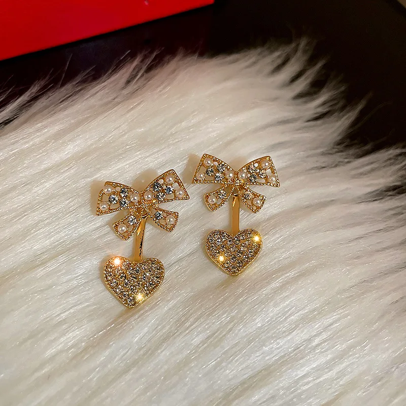 Pearl Bow Love Earrings Advanced French Temperament Sweet Earrings Exquisite Autumn and Winter Earrings S925 Silver Needle
Pearl Bow Love Earrings Advanced French Temperament Sweet Earrings Exquisite Autumn and Winter Earrings S925 Silver Needle