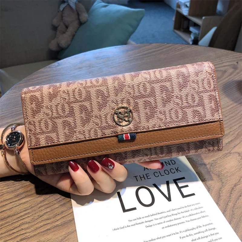 Genuine Fashion Leather Women Wallets Long Cowhide Purse Original Brand Letter Print Clutch Bags For Ladies Birthday Present
Genuine Fashion Leather Women Wallets Long Cowhide Purse Original Brand Letter Print Clutch Bags For Ladies Birthday Present