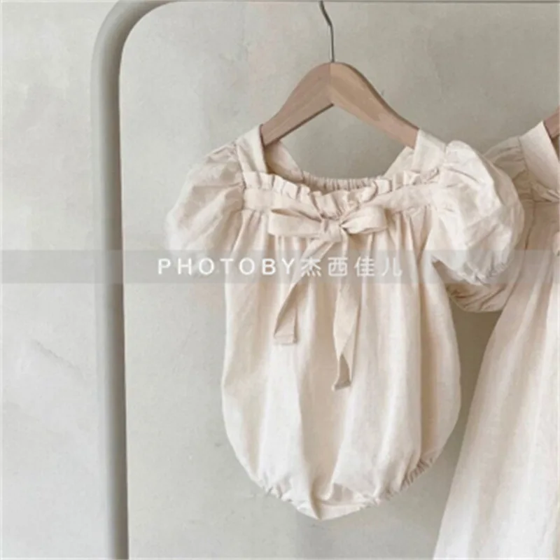 

Baby girl summer dress new jumpsuit ins baby bow puff sleeve sweet square collar bag fart romper