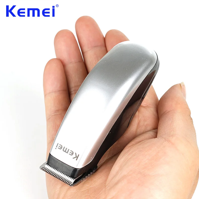

Kemei Newly Design Electric Hair Clipper Mini Portable Hair Trimmer Cutting Machine Beard Barber Razor Men Style Tools KM-666