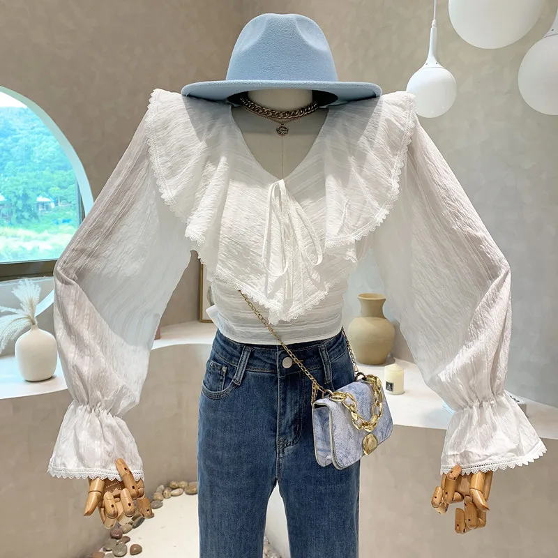 Niche Design New In Women's Clothing 2022 Autumn Vintage Blue V-neck Long Sleeve Ruffle Bandage Bow Shirt Top Chiffon Blouses
Niche Design New In Women's Clothing 2022 Autumn Vintage Blue V-neck Long Sleeve Ruffle Bandage Bow Shirt Top Chiffon Blouses