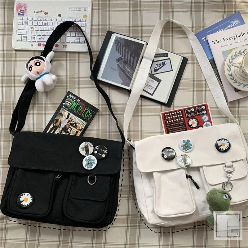 Female Harajuku Messenger Bag Canvas Messenger Korean Version Tooling Multi-functional Outdoor Travel Student Women's Bag 2022
Female Harajuku Messenger Bag Canvas Messenger Korean Version Tooling Multi-functional Outdoor Travel Student Women's Bag 2022