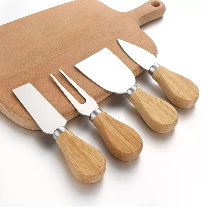 New 4pcs/set Stainless Steel Cheese Knives Oak Handle Cheese Cutter Cheese Board Butter Spatula Kitchen Cheese Tools
New 4pcs/set Stainless Steel Cheese Knives Oak Handle Cheese Cutter Cheese Board Butter Spatula Kitchen Cheese Tools