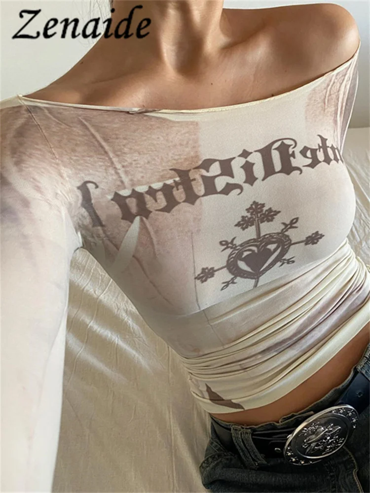 Женская футболка с длинным рукавом, открытыми плечами и принтом
Женская футболка с длинным рукавом, открытыми плечами и принтом