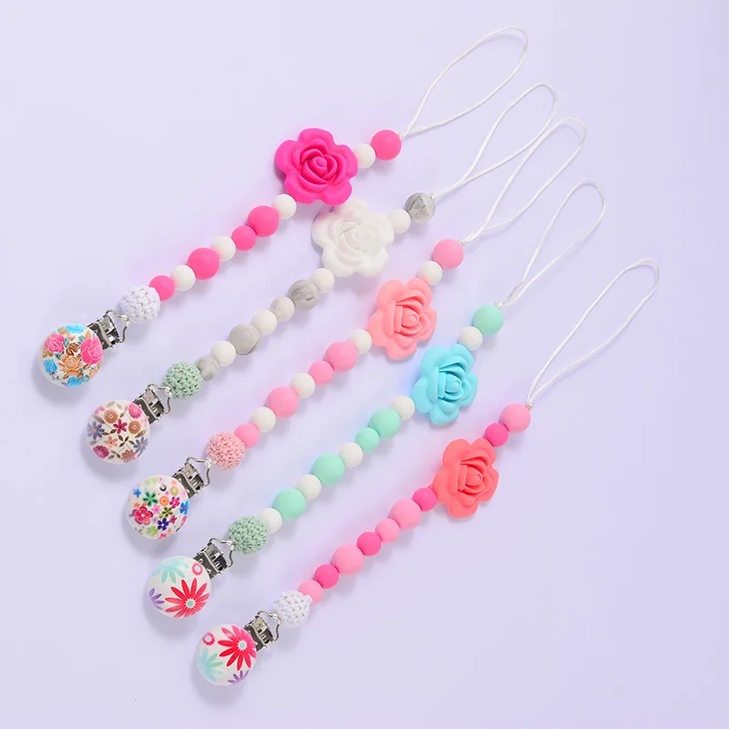 Baby Pacifier Clips 9 Colors Handmade Food Grade Silicone Rose Flower Pacifier Chain For Babies Teething Toy Holder Chain
Baby Pacifier Clips 9 Colors Handmade Food Grade Silicone Rose Flower Pacifier Chain For Babies Teething Toy Holder Chain