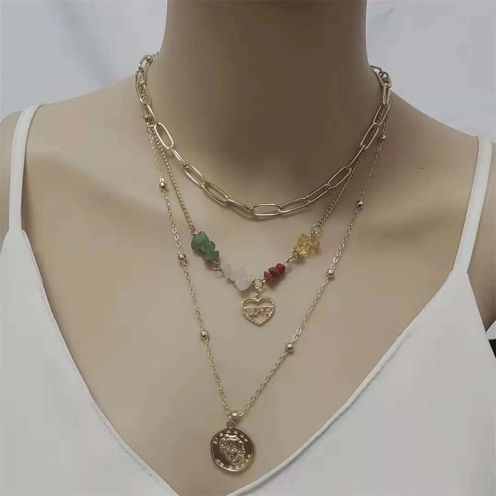 European and American fashion multi-layer natural gravel Necklace New Creative Love Pendant gold alloy human head Necklace
European and American fashion multi-layer natural gravel Necklace New Creative Love Pendant gold alloy human head Necklace