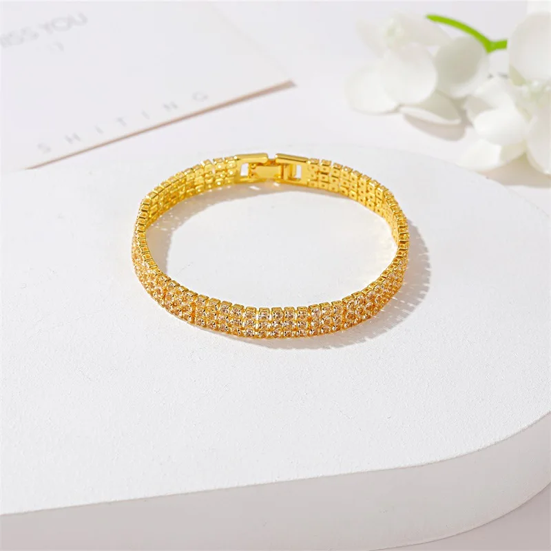 Exquisite Simple Gold Color Tennis Chain Bracelet Three Row Shiny Zircon Bracelet for Women Bride Wedding Dinner Luxury Jewelry
Exquisite Simple Gold Color Tennis Chain Bracelet Three Row Shiny Zircon Bracelet for Women Bride Wedding Dinner Luxury Jewelry