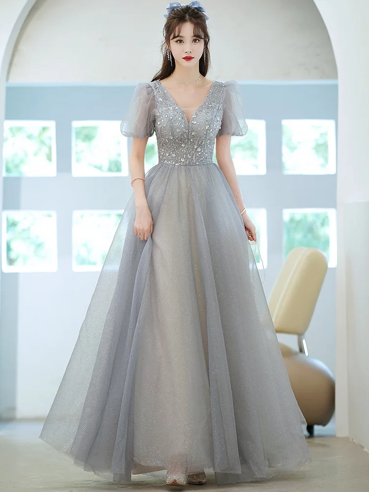 Fancy Gray Evening Dresses V-Neck Short Sleeves Lace-up Back Floor Length Prom Gowns
Fancy Gray Evening Dresses V-Neck Short Sleeves Lace-up Back Floor Length Prom Gowns