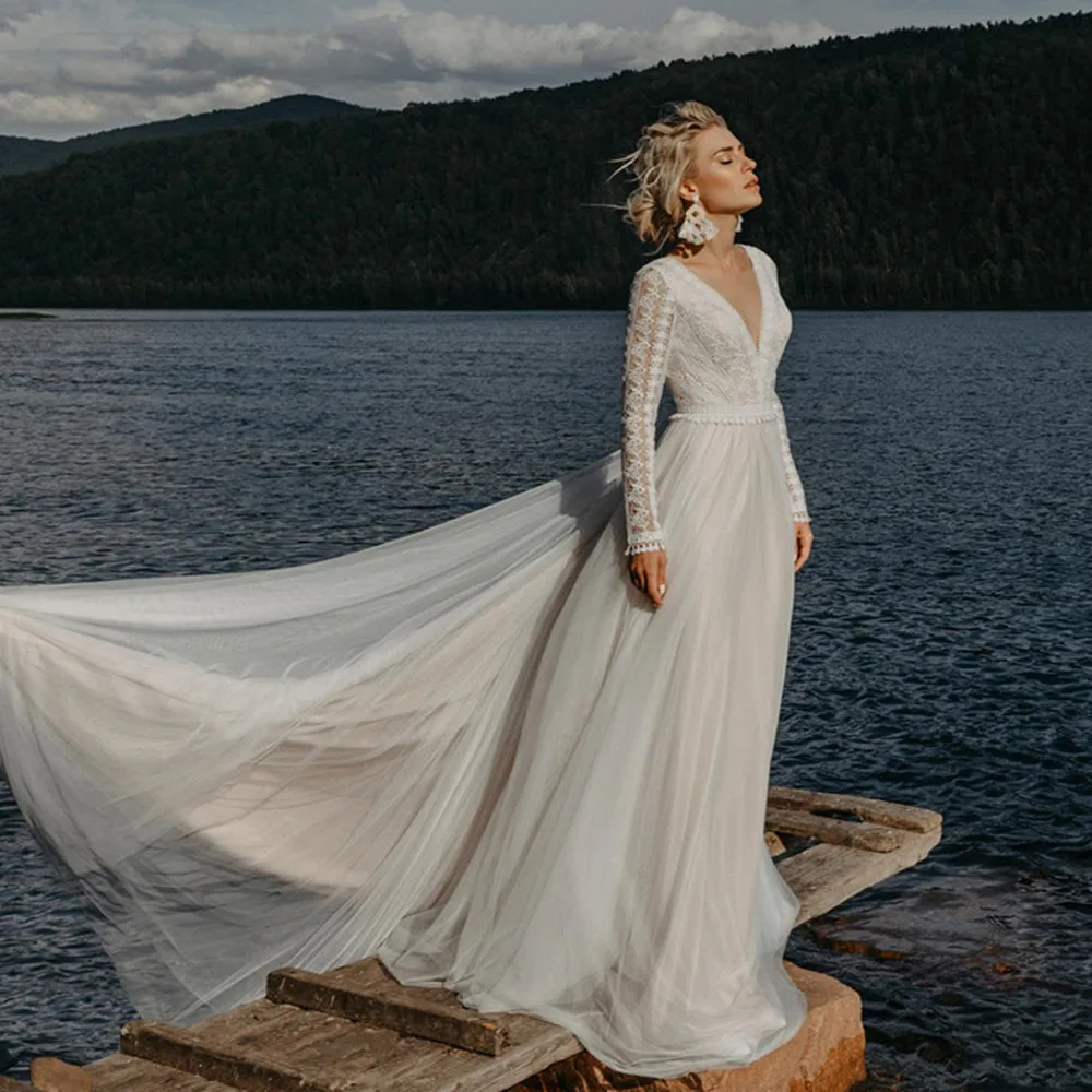 Bohemian Long Sleeve Wedding Dresses A Line V Neck Backless Lace Tulle Beach Bridal Gowns Long Boho Bride Dress Robe De Mariee
Bohemian Long Sleeve Wedding Dresses A Line V Neck Backless Lace Tulle Beach Bridal Gowns Long Boho Bride Dress Robe De Mariee