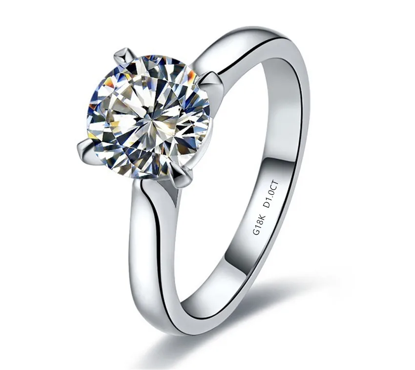 Фото Обручальное кольцо с муассанитом из белого золота 18 К AU750 бриллиантом 1 карат