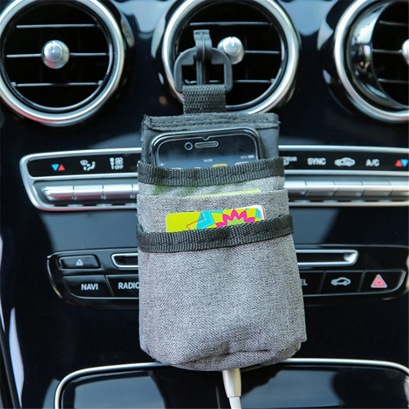 Multi-functional Car Organizer Bag Storage Phone Pocket Oxford Hanging Holder Outlet Air Vent Stowing Tidying Interior Accessori 
Multi-functional Car Organizer Bag Storage Phone Pocket Oxford Hanging Holder Outlet Air Vent Stowing Tidying Interior Accessori