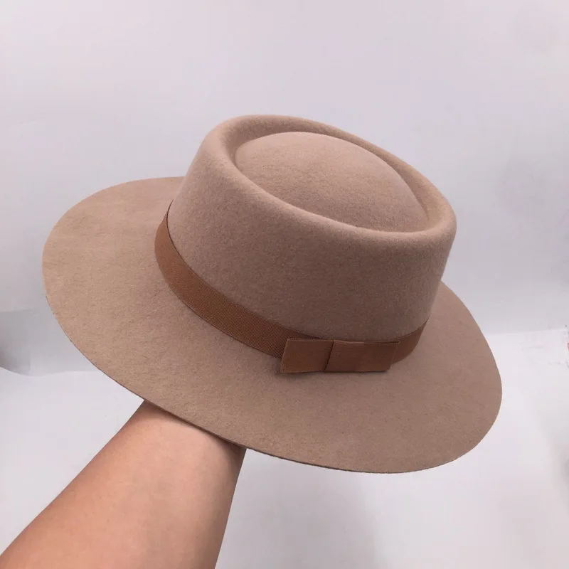 202306-shi Korea winter wool felt Circle top solid bowknot ribbon lady fedoras cap men women leisure holiday panama jazz hat 
202306-shi Korea winter wool felt Circle top solid bowknot ribbon lady fedoras cap men women leisure holiday panama jazz hat