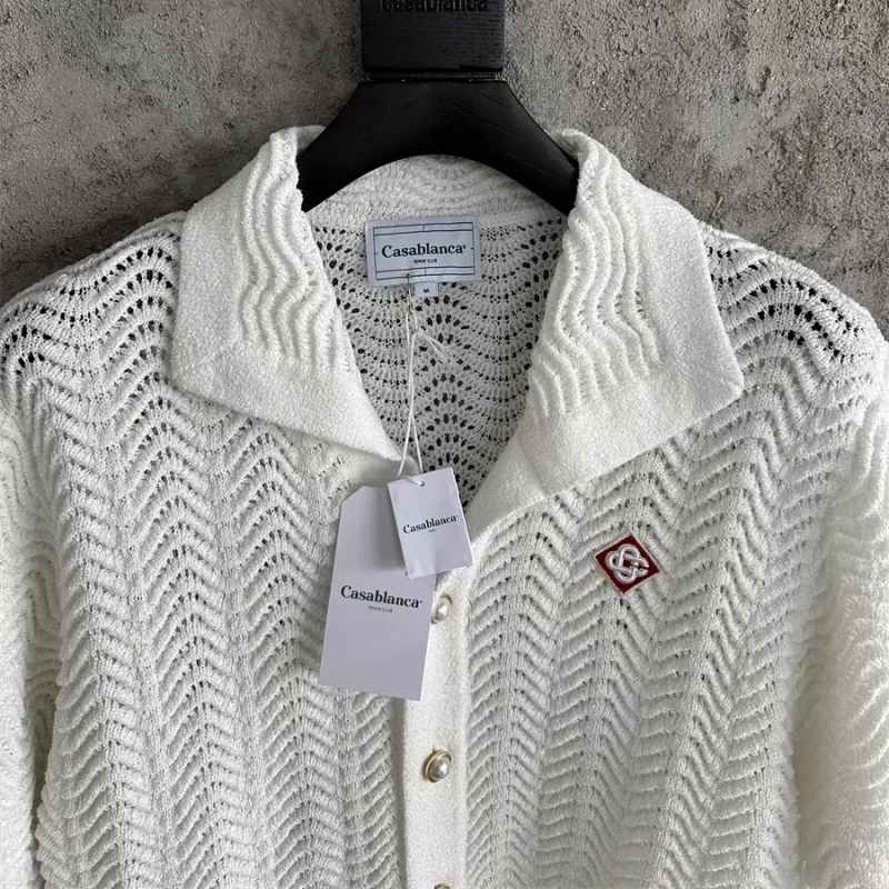 Oversized Casablanca Jacquard Knitted Cardigans Men Women 1:1 Top Quality Stripe White Sweaters Pearl Buttons Sweatercoats 
Oversized Casablanca Jacquard Knitted Cardigans Men Women 1:1 Top Quality Stripe White Sweaters Pearl Buttons Sweatercoats
