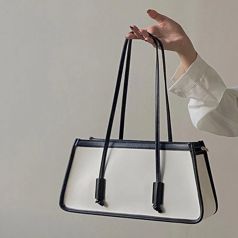 2022 New Handle Bag Women Retro Handbag PU Leather Shoulder Totes Underarm Top Handle Bag Female Small Subaxillary Bags Clutch 
2022 New Handle Bag Women Retro Handbag PU Leather Shoulder Totes Underarm Top Handle Bag Female Small Subaxillary Bags Clutch