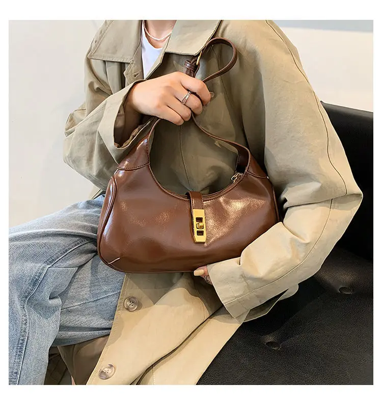 Niche Bag Women's 2022 New Solid Color Baguette Bag Retro Metal Buckle One-Shoulder Medieval Armpit Bag Ladies Handbags Vintage
Niche Bag Women's 2022 New Solid Color Baguette Bag Retro Metal Buckle One-Shoulder Medieval Armpit Bag Ladies Handbags Vintage