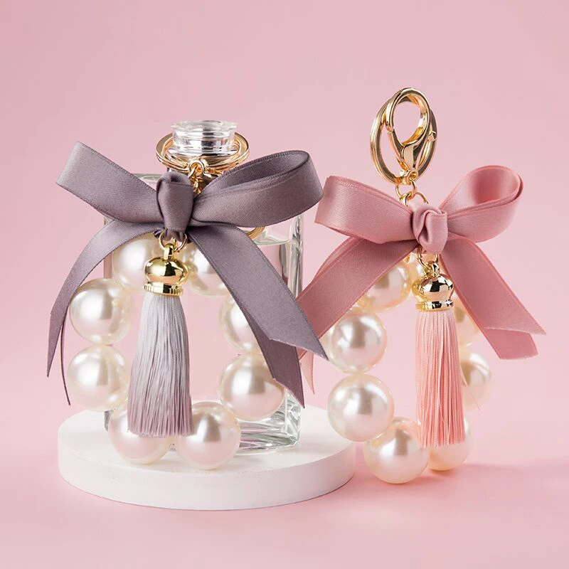 Искусственный жемчуг, кисточка, автомобильный брелок для ключей, Женская сумочка, Круглый Кулон, брелок, чехол для наушников, чехол
Искусственный жемчуг, кисточка, автомобильный брелок для ключей, Женская сумочка, Круглый Кулон, брелок, чехол для наушников, чехол