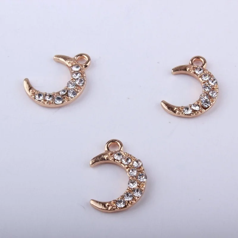 20PCS/Lot 12*17MM Rhinestone Paved Gold Color Tone Alloy Cartoon Moon Pendant Charms Ornament Accessories Floating Pendant
20PCS/Lot 12*17MM Rhinestone Paved Gold Color Tone Alloy Cartoon Moon Pendant Charms Ornament Accessories Floating Pendant