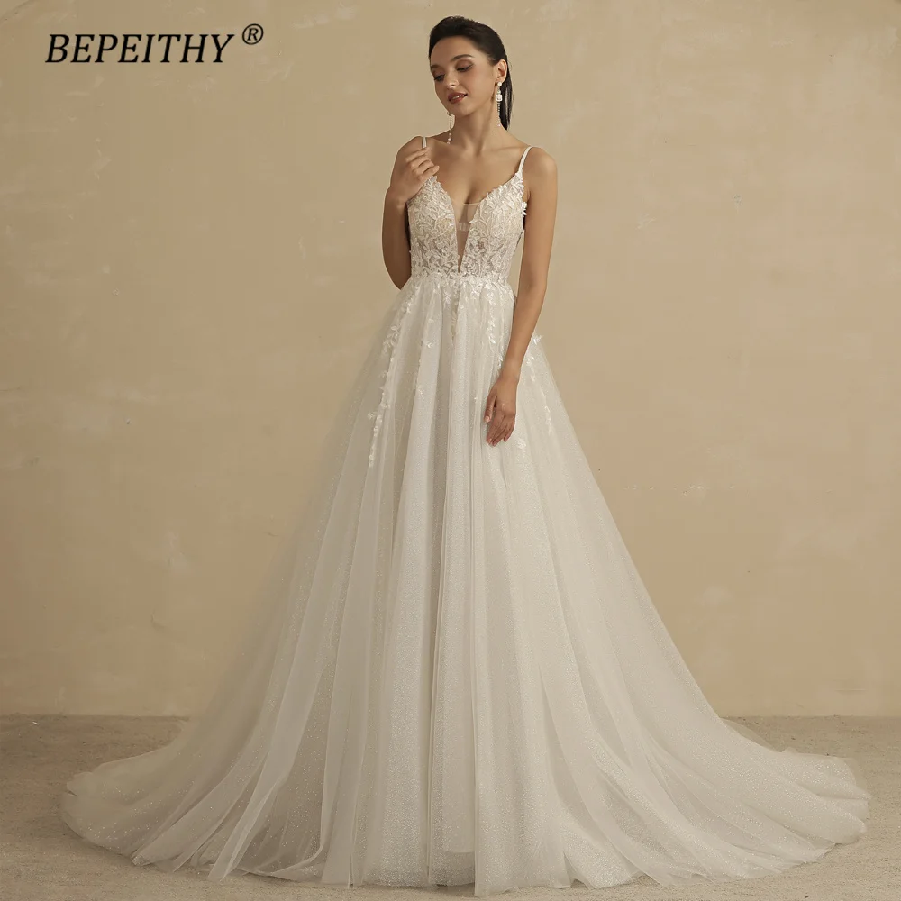 BEPEITHY Deep V Neck Spaghetti Straps A Line Lace Wedding Dresses For Women 2022 Glittler Sleeveless Boho Bridal Party Gown
BEPEITHY Deep V Neck Spaghetti Straps A Line Lace Wedding Dresses For Women 2022 Glittler Sleeveless Boho Bridal Party Gown
