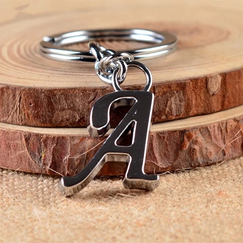 NEW DIY A-Z Letters key Chain Silver Color Metal Keychain Women Car Key Ring Simple Letter Name Key Holder Party Gift Jewelry
NEW DIY A-Z Letters key Chain Silver Color Metal Keychain Women Car Key Ring Simple Letter Name Key Holder Party Gift Jewelry