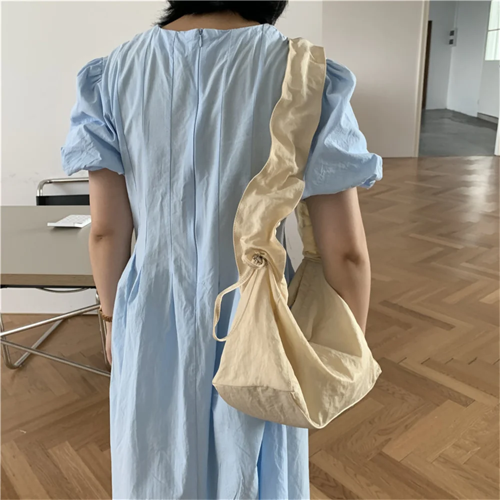 2023 Solid Color Nylon Totes Shoulder Bags for Women Personalized Pleated Drawstring Lady Bag Simple Female Commuter Handbag
2023 Solid Color Nylon Totes Shoulder Bags for Women Personalized Pleated Drawstring Lady Bag Simple Female Commuter Handbag