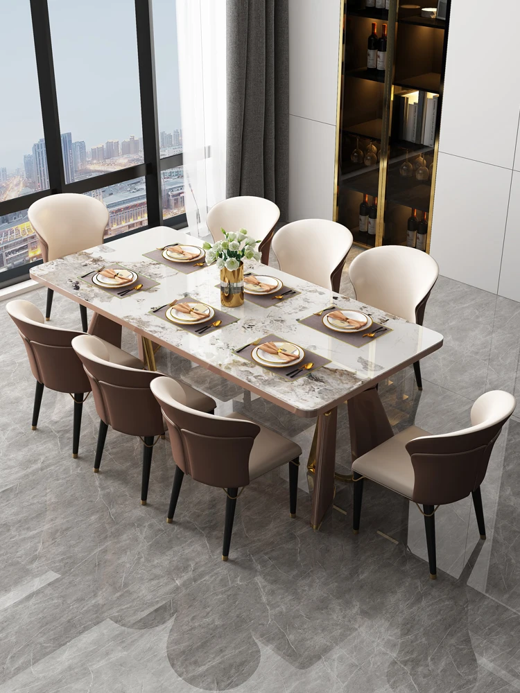 Italian style light luxury designer high-end rock plate dining table modern simple meal table and chair combination 
Italian style light luxury designer high-end rock plate dining table modern simple meal table and chair combination