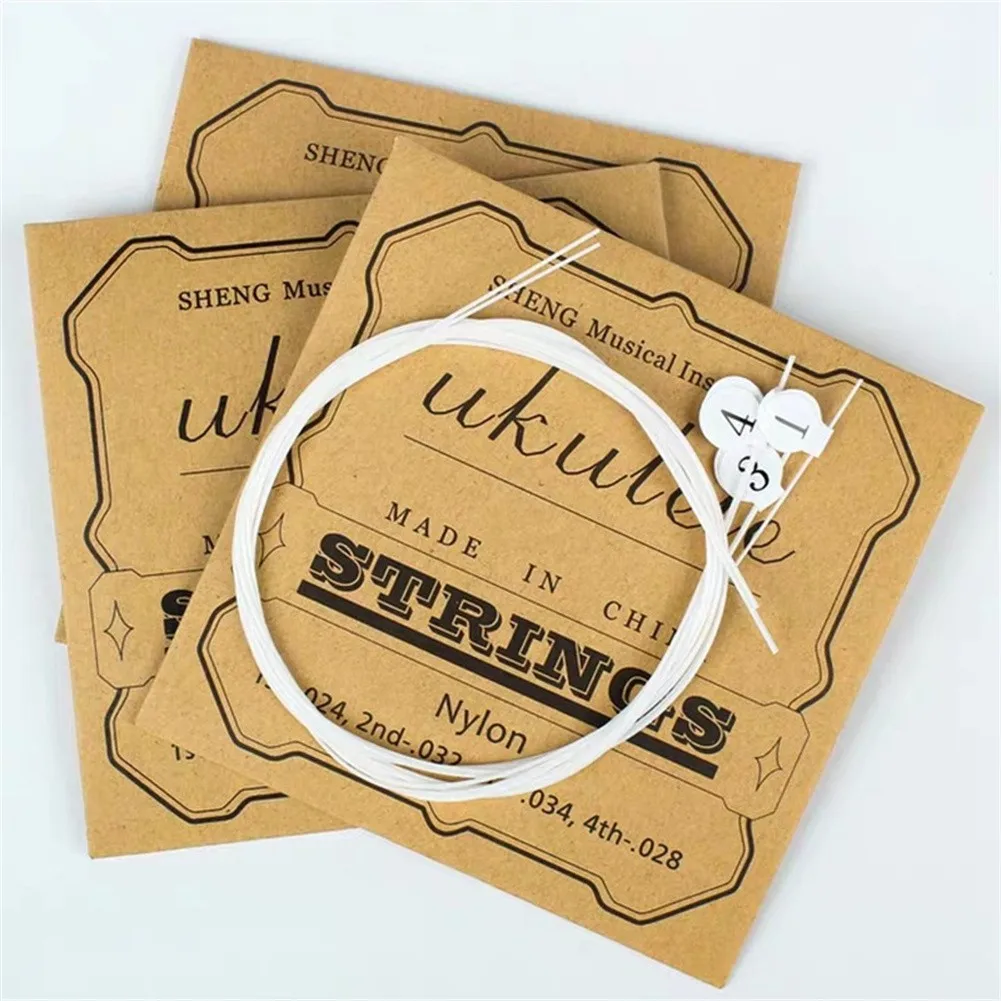 Classic Nylon Ukulele Strings Pure Delicate Tone Numbered Tabs For Easy Identification 21/23/26 Inch Ukuleles Guitar Accessories
Classic Nylon Ukulele Strings Pure Delicate Tone Numbered Tabs For Easy Identification 21/23/26 Inch Ukuleles Guitar Accessories