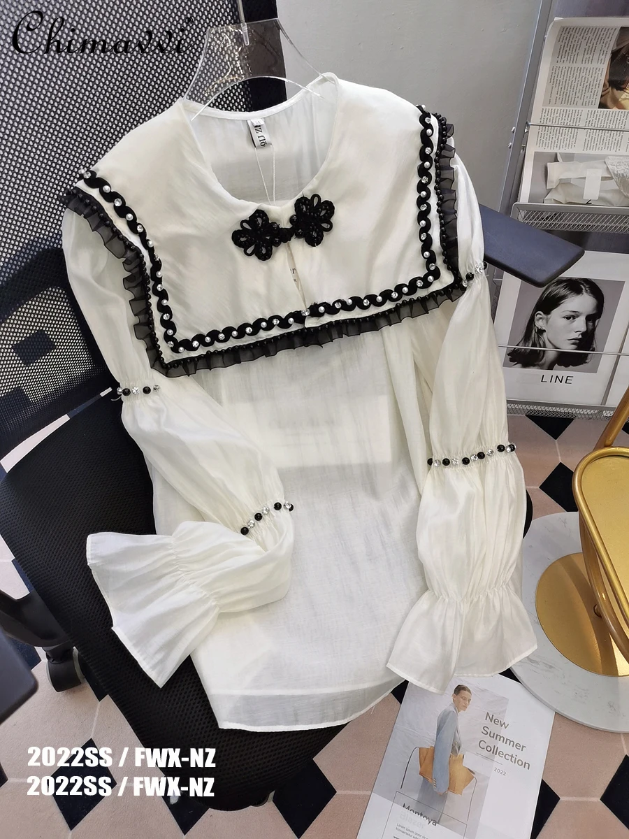 2022 Spring Clothes New Fashion Sweet Buckle Stringy Selvedge Shirt Heavy Beads Diamond Sailor Collar Bell Sleeve Blouse Women
2022 Spring Clothes New Fashion Sweet Buckle Stringy Selvedge Shirt Heavy Beads Diamond Sailor Collar Bell Sleeve Blouse Women