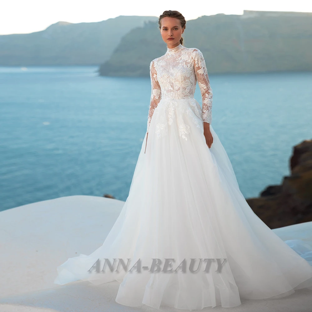 Anna Wedding Dresses For Women High Neck Long Sleeve A Line Tulle Lace Appliques Illusion Button Sweep Train Vestidos De Novia
Anna Wedding Dresses For Women High Neck Long Sleeve A Line Tulle Lace Appliques Illusion Button Sweep Train Vestidos De Novia