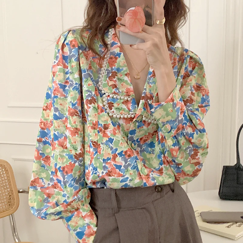 Clothland Women Sweet Floral Blouse Beading Pearl Decorate Long Sleeve Shirts Summer Chic Sweet Tops Blusas LA415
Clothland Women Sweet Floral Blouse Beading Pearl Decorate Long Sleeve Shirts Summer Chic Sweet Tops Blusas LA415