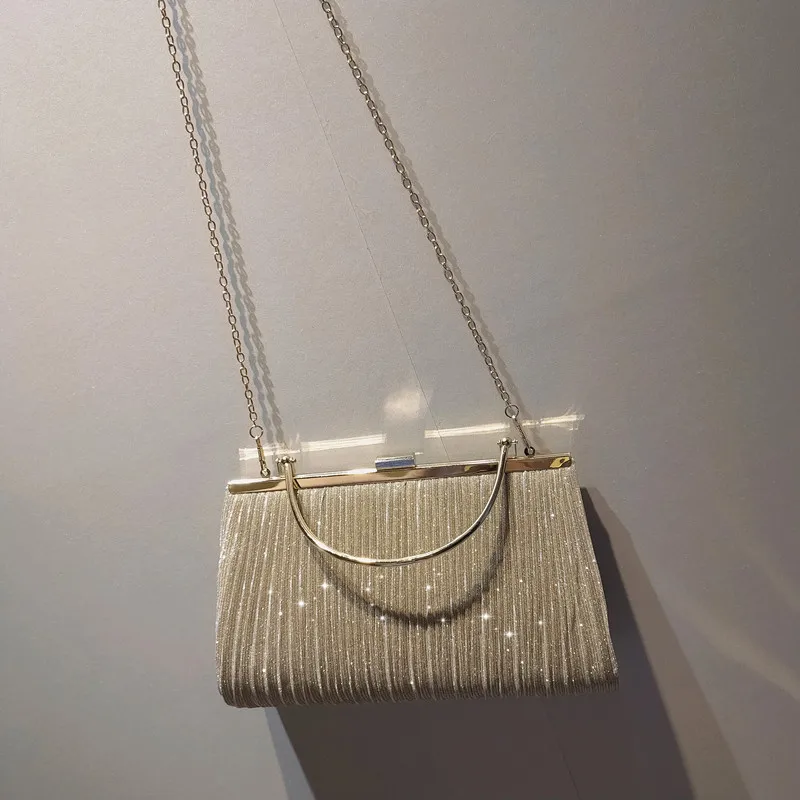 The new shiny ruffled large-capacity handbag princess bag diagonal cross bag dinner bag dress bag KTV handbag small bag
The new shiny ruffled large-capacity handbag princess bag diagonal cross bag dinner bag dress bag KTV handbag small bag