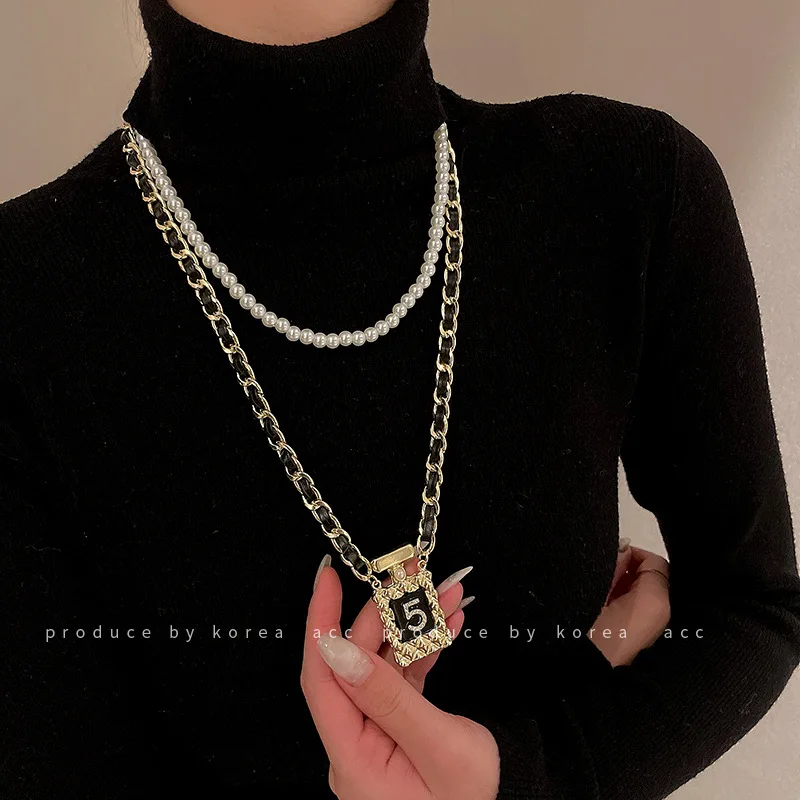 Pearl Crystal Number 5 Necklaces for Women Bottle Perfume Layered Clavicle Chain Retro Sweater Chain Collores
Pearl Crystal Number 5 Necklaces for Women Bottle Perfume Layered Clavicle Chain Retro Sweater Chain Collores
