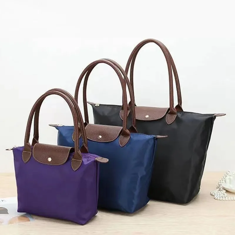 Women Nylon Shopping Bags Oxford Cloth Shoulder Bags Handbag Frabic Folding Storage Bags for Females Waterproof Dumpling Totebag
Women Nylon Shopping Bags Oxford Cloth Shoulder Bags Handbag Frabic Folding Storage Bags for Females Waterproof Dumpling Totebag