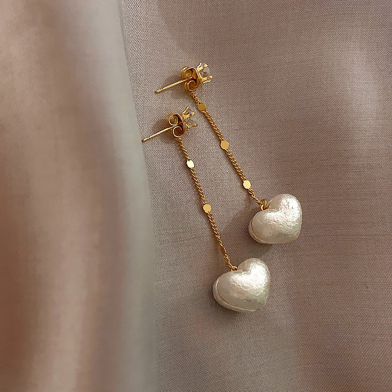French Simple And Versatile Peach Heart Pearl Tassel Earrings For Women Korean Fashion Earring Daily Birthday Party Jewelry Gift
French Simple And Versatile Peach Heart Pearl Tassel Earrings For Women Korean Fashion Earring Daily Birthday Party Jewelry Gift