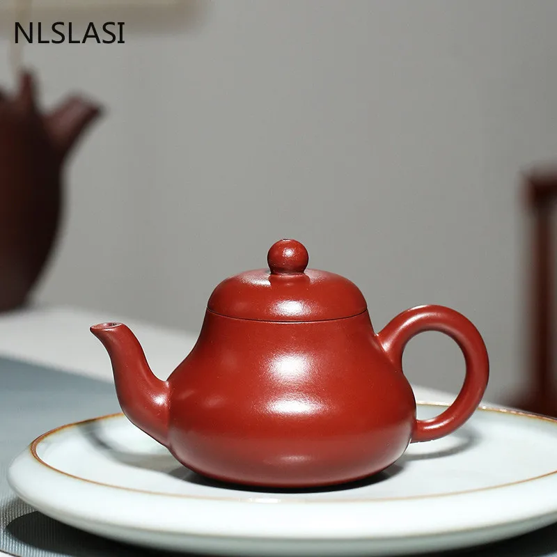 Ручная работа в форме груши Xi Shi чайник из фиолетовой глины чайный набор из китайского исинского чайника чистый чайник аксессуары для домаш... 
Ручная работа в форме груши Xi Shi чайник из фиолетовой глины чайный набор из китайского исинского чайника чистый чайник аксессуары для домаш...