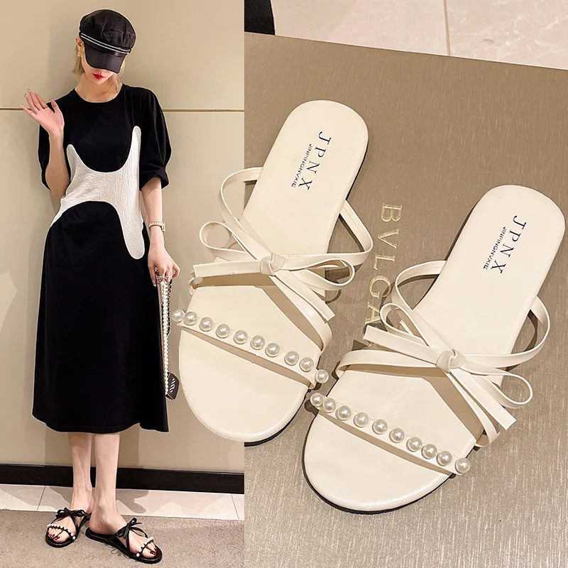 2022 Large Bowknot Beaded Flat Bottom Women's Slippers Summer Temperament Niche Flat Bottom Sandals
2022 Large Bowknot Beaded Flat Bottom Women's Slippers Summer Temperament Niche Flat Bottom Sandals