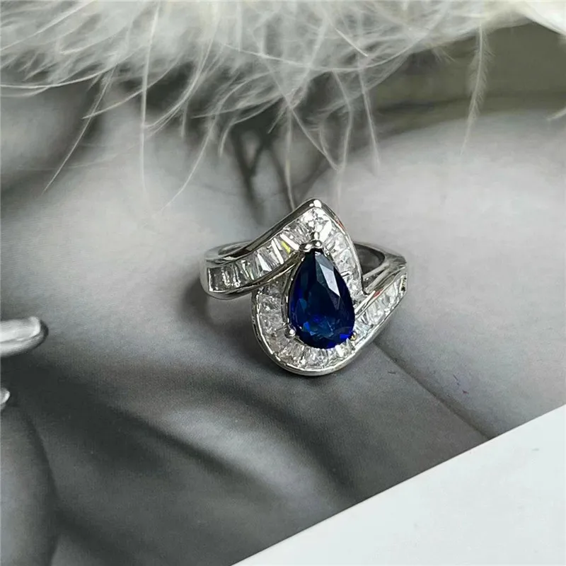 Deluxe Water Drop Sapphire Women's Ring CZ Crystal Finger Ring Engagement Wedding Jewelry Hot Sale Valentine's Day Gift
Deluxe Water Drop Sapphire Women's Ring CZ Crystal Finger Ring Engagement Wedding Jewelry Hot Sale Valentine's Day Gift