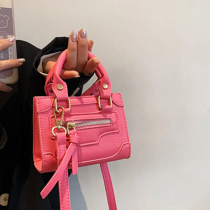 Candy Color Women's Handbag The Cute Tote Bag for Ladies Motor Style Solid Small Purse PU Leather Phone Pouch Female Sac a Main
Candy Color Women's Handbag The Cute Tote Bag for Ladies Motor Style Solid Small Purse PU Leather Phone Pouch Female Sac a Main
