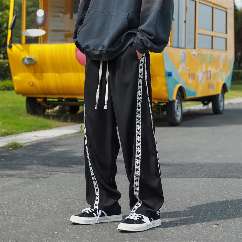 Striped braided tape Wide-leg Pants Men Spring Summer Fashion Oversized Pants Men Loose Straight Male Trousers 5XL-M
Striped braided tape Wide-leg Pants Men Spring Summer Fashion Oversized Pants Men Loose Straight Male Trousers 5XL-M