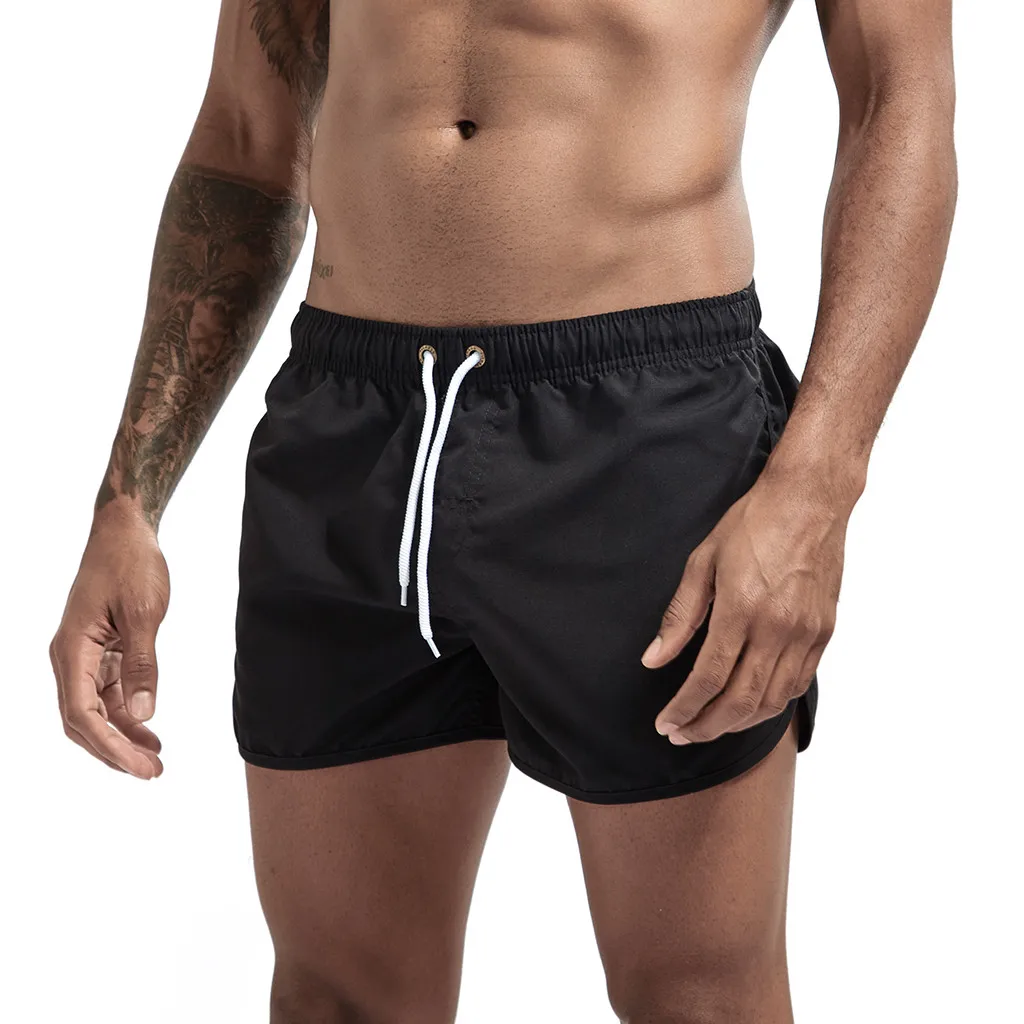 

mężczyzn w jednolitym kolorze szybkoschnący spodenki ze sznurkiem mężczyzna biegający Fitness Sport krótkie spodnie plażowe