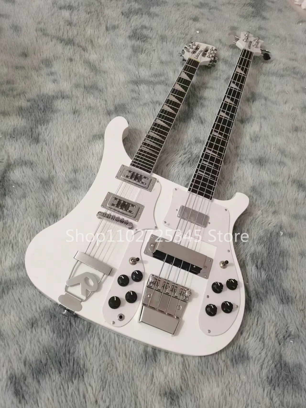 Double Neck Guitar with 4 Strings, Bass, Rose Wood Fingerboard, Silver Accessories, Seller to Bear Shipping Cost
Double Neck Guitar with 4 Strings, Bass, Rose Wood Fingerboard, Silver Accessories, Seller to Bear Shipping Cost
