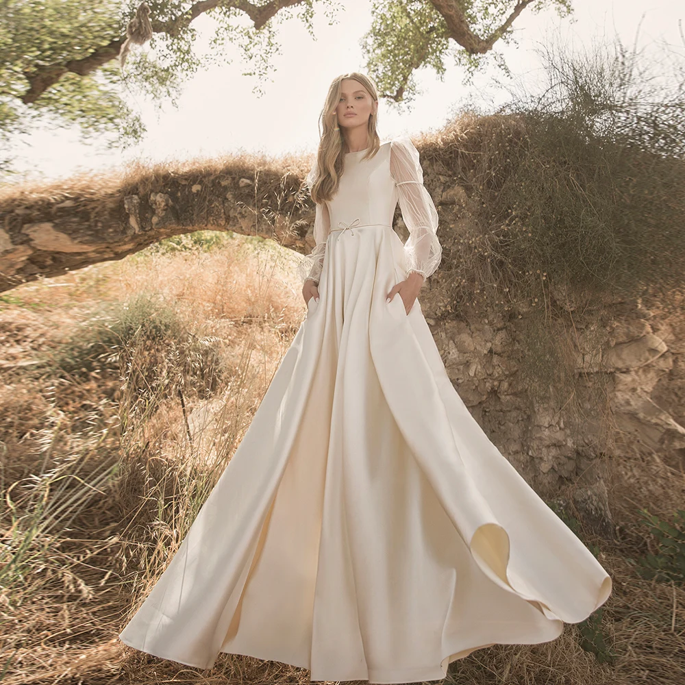 Simple Wedding Dresses Satin Jewel Neck Bridal Dress with Bow Long Sleeves Wedding Gowns A-line Floor Length Vestidos De Novia
Simple Wedding Dresses Satin Jewel Neck Bridal Dress with Bow Long Sleeves Wedding Gowns A-line Floor Length Vestidos De Novia