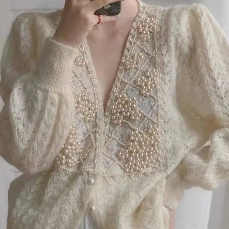 Elegant Women Sweater 2023 Spring Autumn Vintage Long Sleeve V Neck Hollow Out Beads Patchwork Cardigan
Elegant Women Sweater 2023 Spring Autumn Vintage Long Sleeve V Neck Hollow Out Beads Patchwork Cardigan