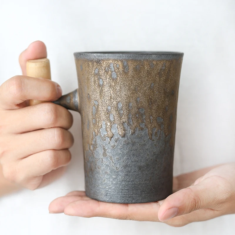 Japanese style Vintage Ceramic Coffee Mug tea Cup Tumbler Rust Glaze Office Tea Milk Beer Mug with spoon Wood Handle Water Cup
Japanese style Vintage Ceramic Coffee Mug tea Cup Tumbler Rust Glaze Office Tea Milk Beer Mug with spoon Wood Handle Water Cup