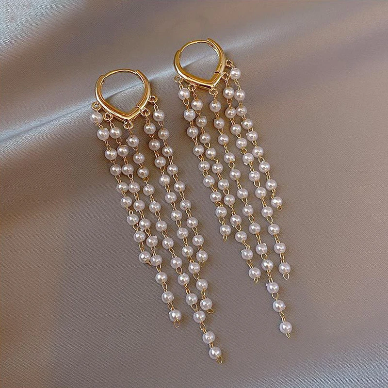 South Korea Long Tassels Of Pearl Earrings Design Feeling Simple Lady Fan Fashion Love Ear Clip Individuality Elegant Earrings
South Korea Long Tassels Of Pearl Earrings Design Feeling Simple Lady Fan Fashion Love Ear Clip Individuality Elegant Earrings