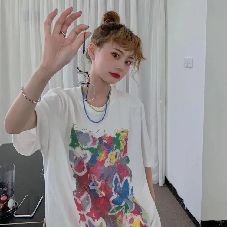 6764 women new design sense age reduction loose casual white graffiti printed T-shirt
6764 women new design sense age reduction loose casual white graffiti printed T-shirt